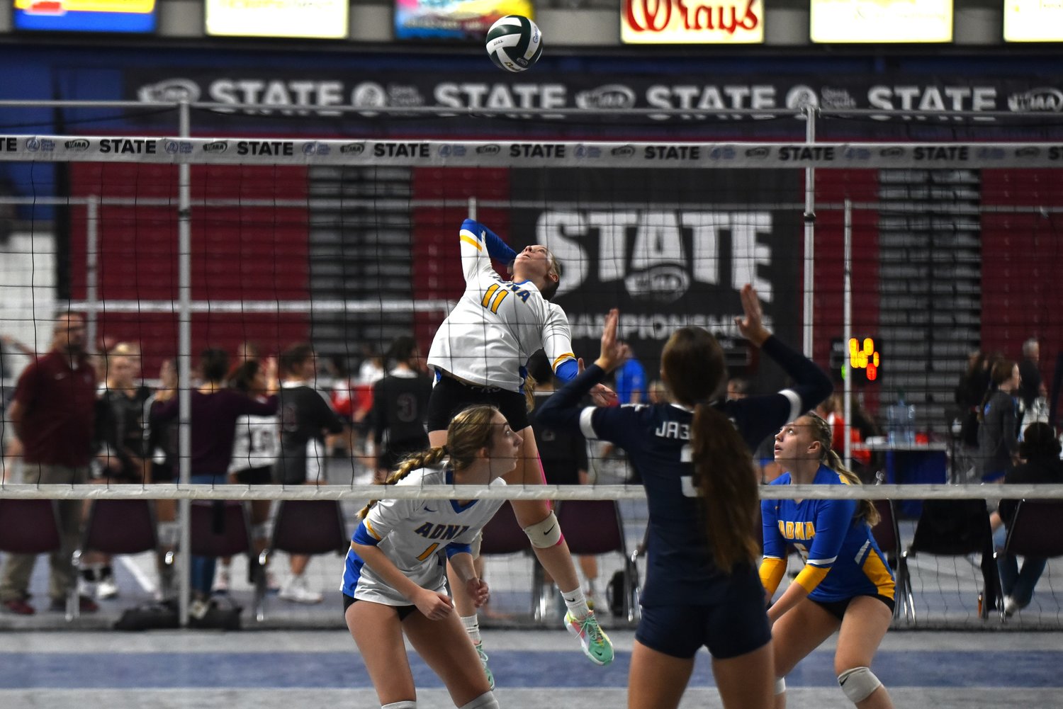 Kendall Humphrey goes up for a spike in the second set of No. 5 Adna's three-set win over No. 12 Tri-Cities Prep in the first round of the 2B state volleyball tournament on Nov. 10, at the Yakima Valley SunDome.